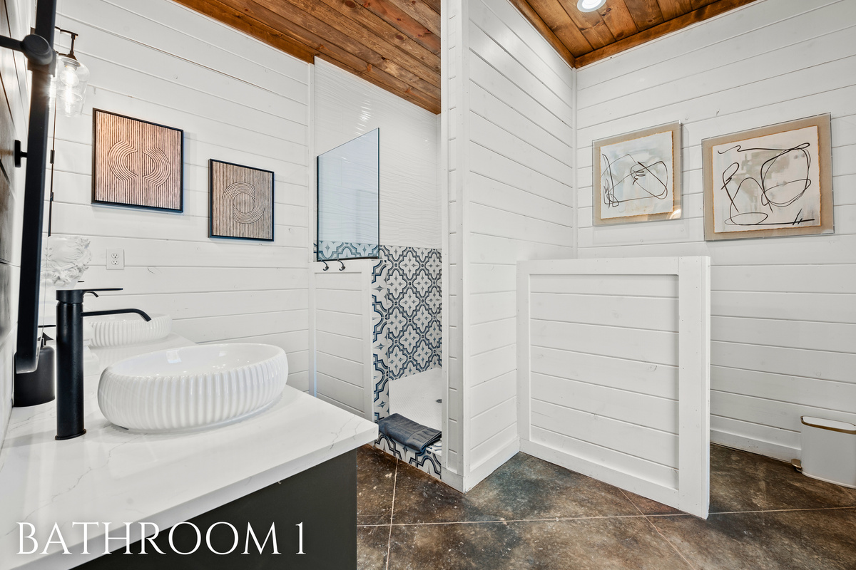 The spa-inspired ensuite bathroom features a luxurious soaking tub, modern fixtures, and plenty of space to refresh and recharge.