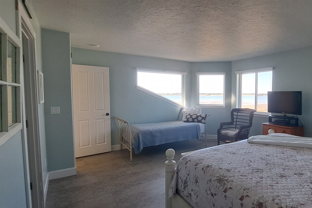 Master suite includes a twin daybed, perfect for an afternoon rest.