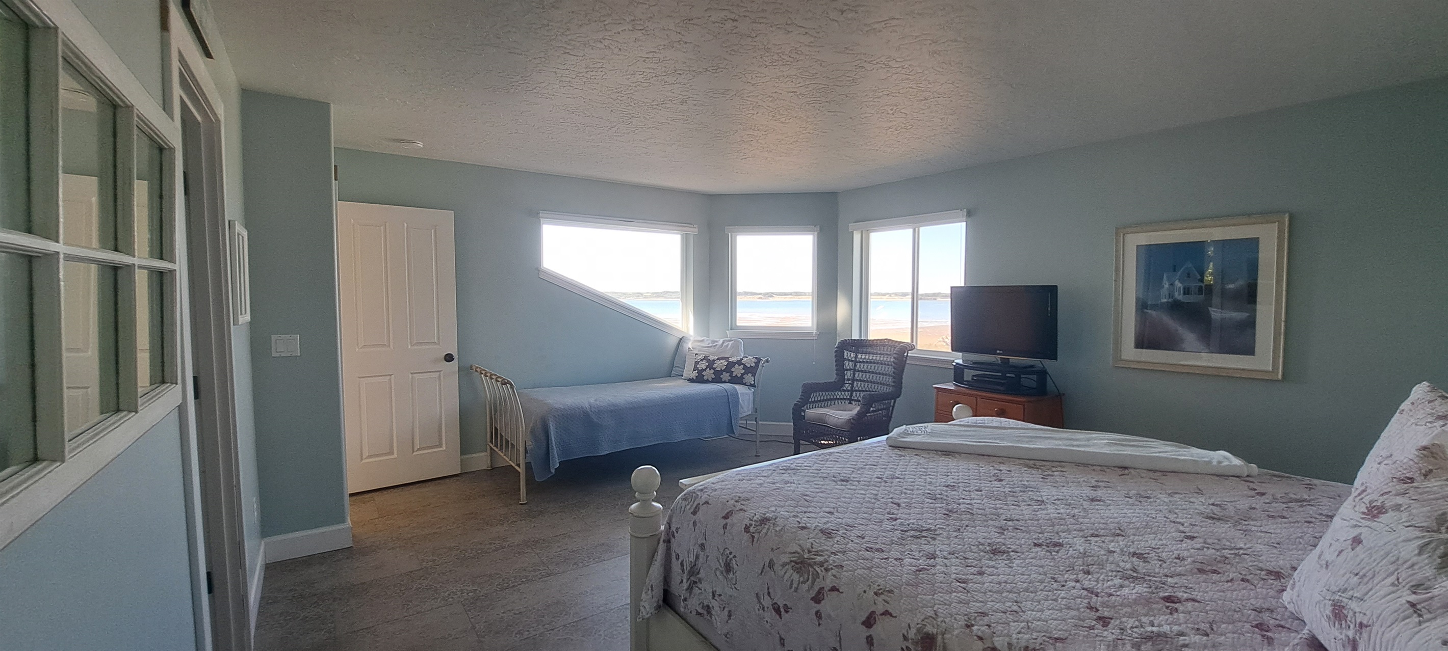 Master suite includes a twin daybed, perfect for an afternoon rest.