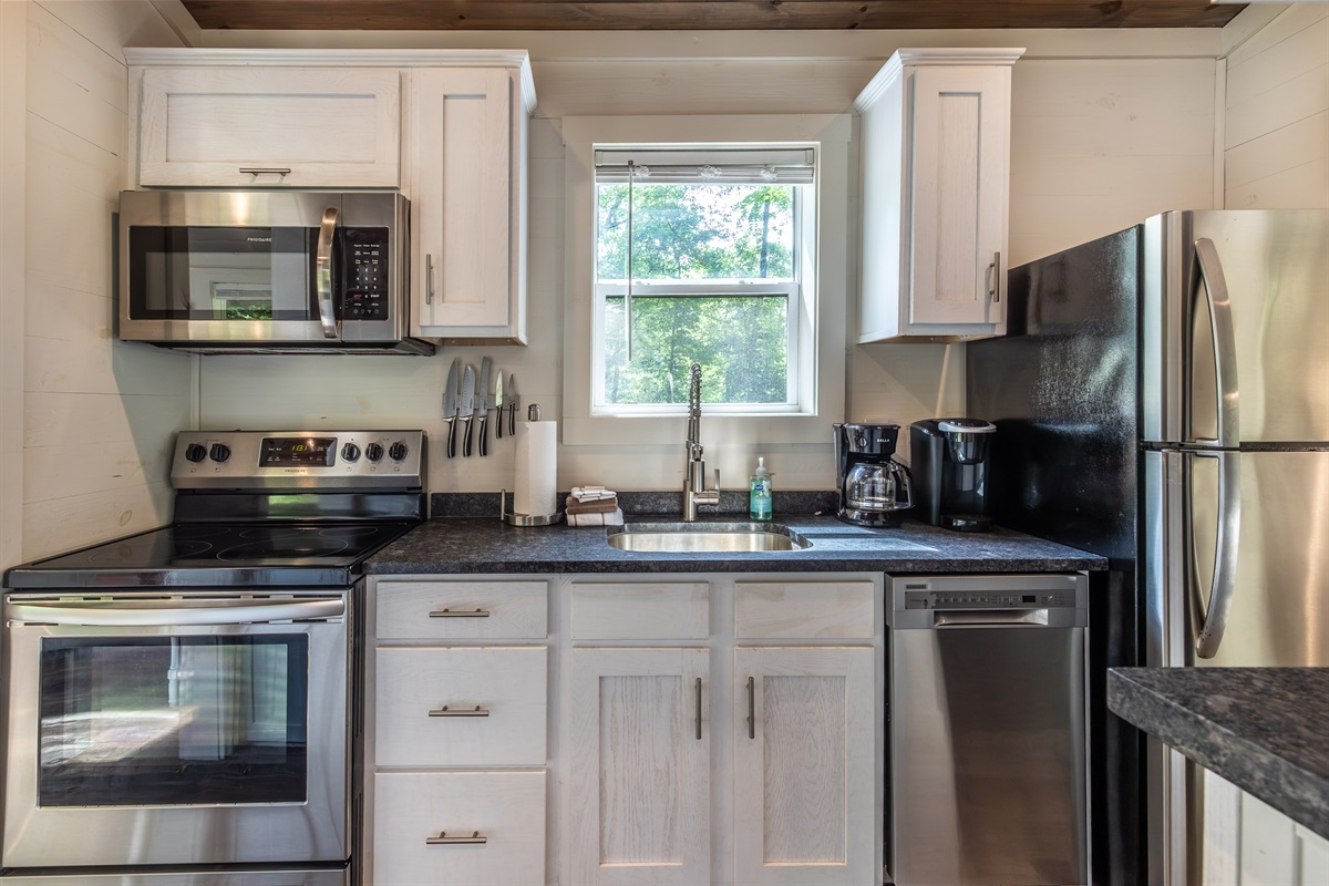 A modern, fully equipped kitchen—everything you need to cook, sip, and savor in the mountains.