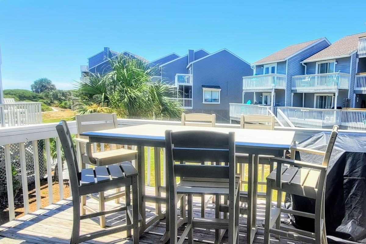 Grill out on the main deck while the Gulf breeze does its thing &mdash; your outdoor dining table seats everyone worth feeding.