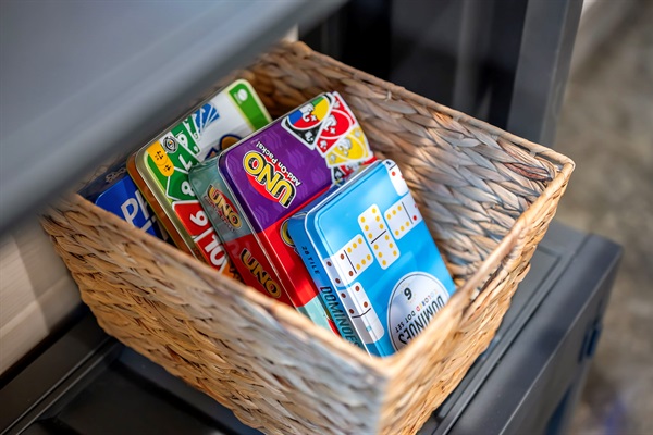 Game room is well stocked with cards, puzzles, and board games