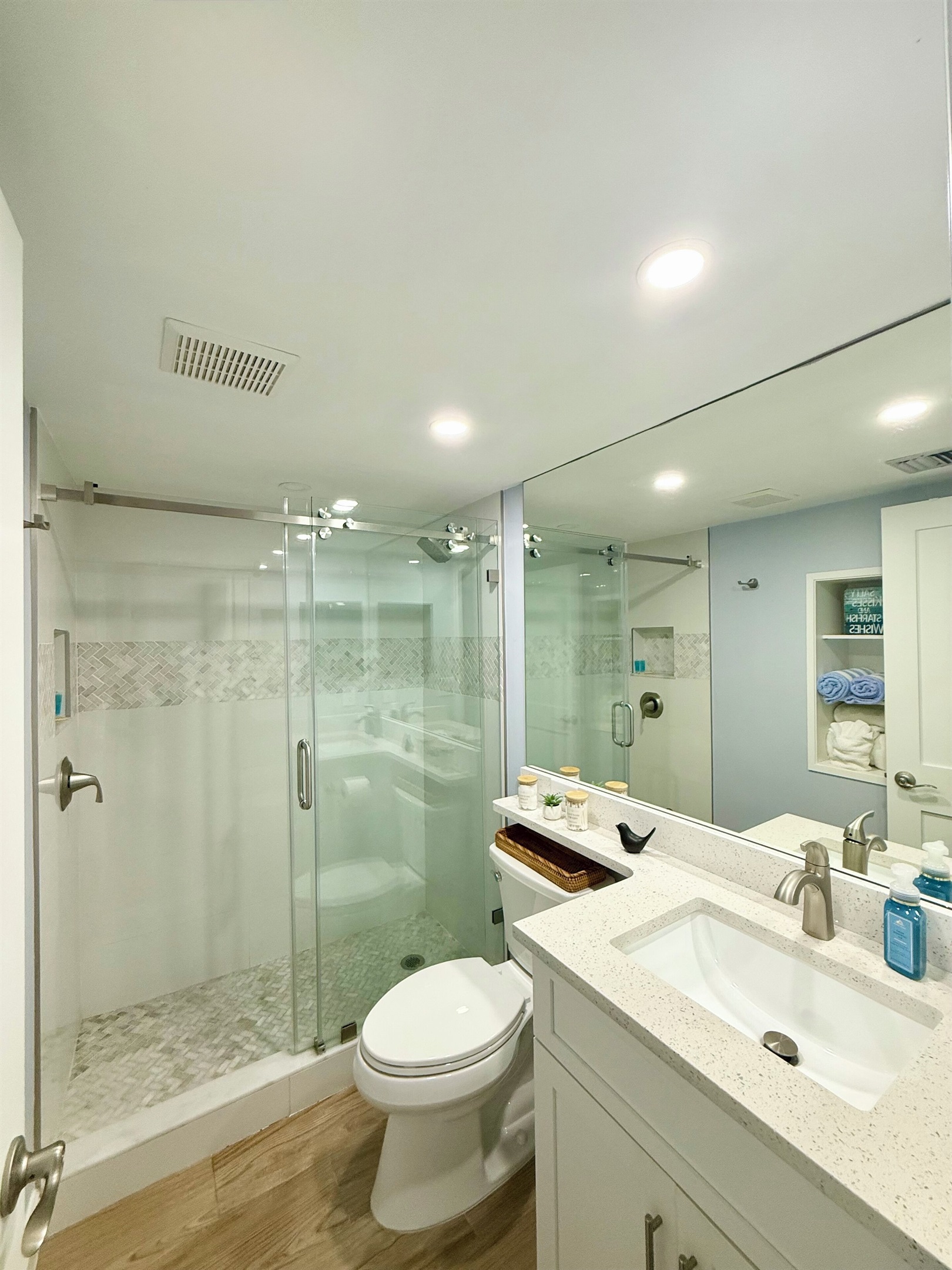 Bathroom renovated for clean coastal vibe & maximal function of space