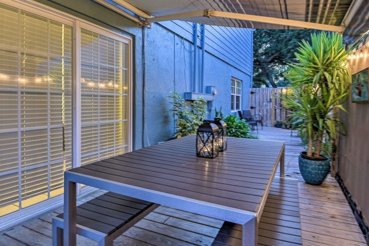 Fenced Side Yard with Awning and Dining Table