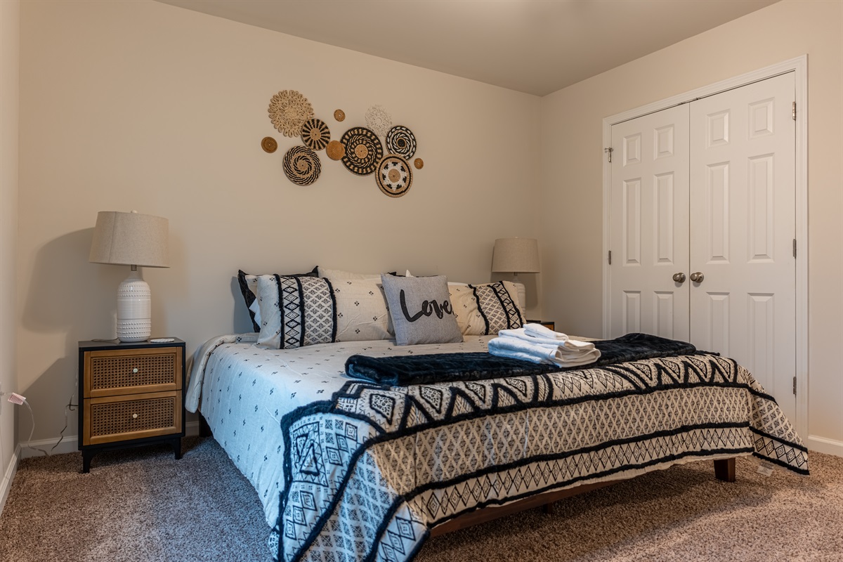 King-sized bed with a cooling, memory foam mattress.(there's also a large smart TV in here)