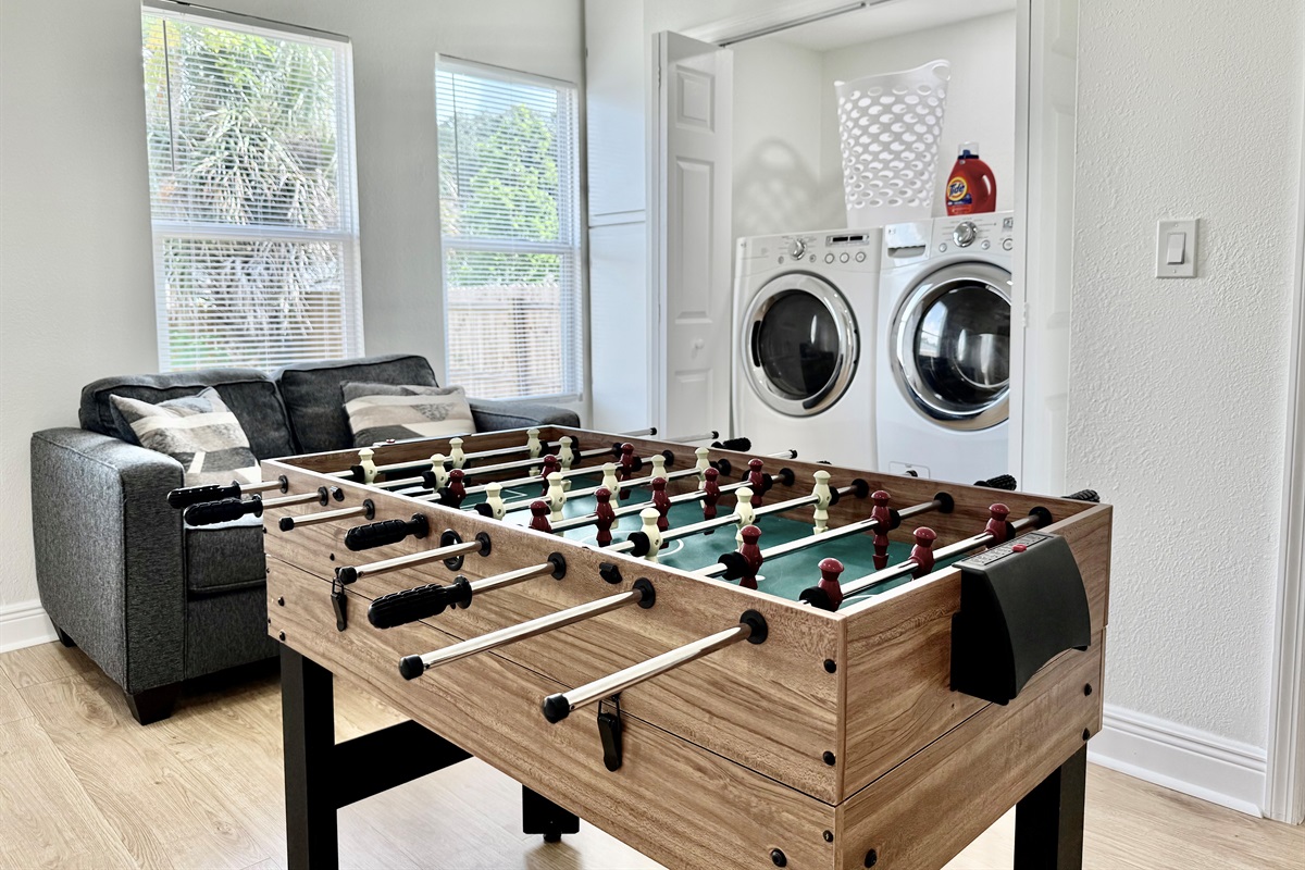 Enjoy some downtime with a lively foosball game, just steps away from the in-home laundry area. Perfect for families, friends, and fun-seekers of all ages.