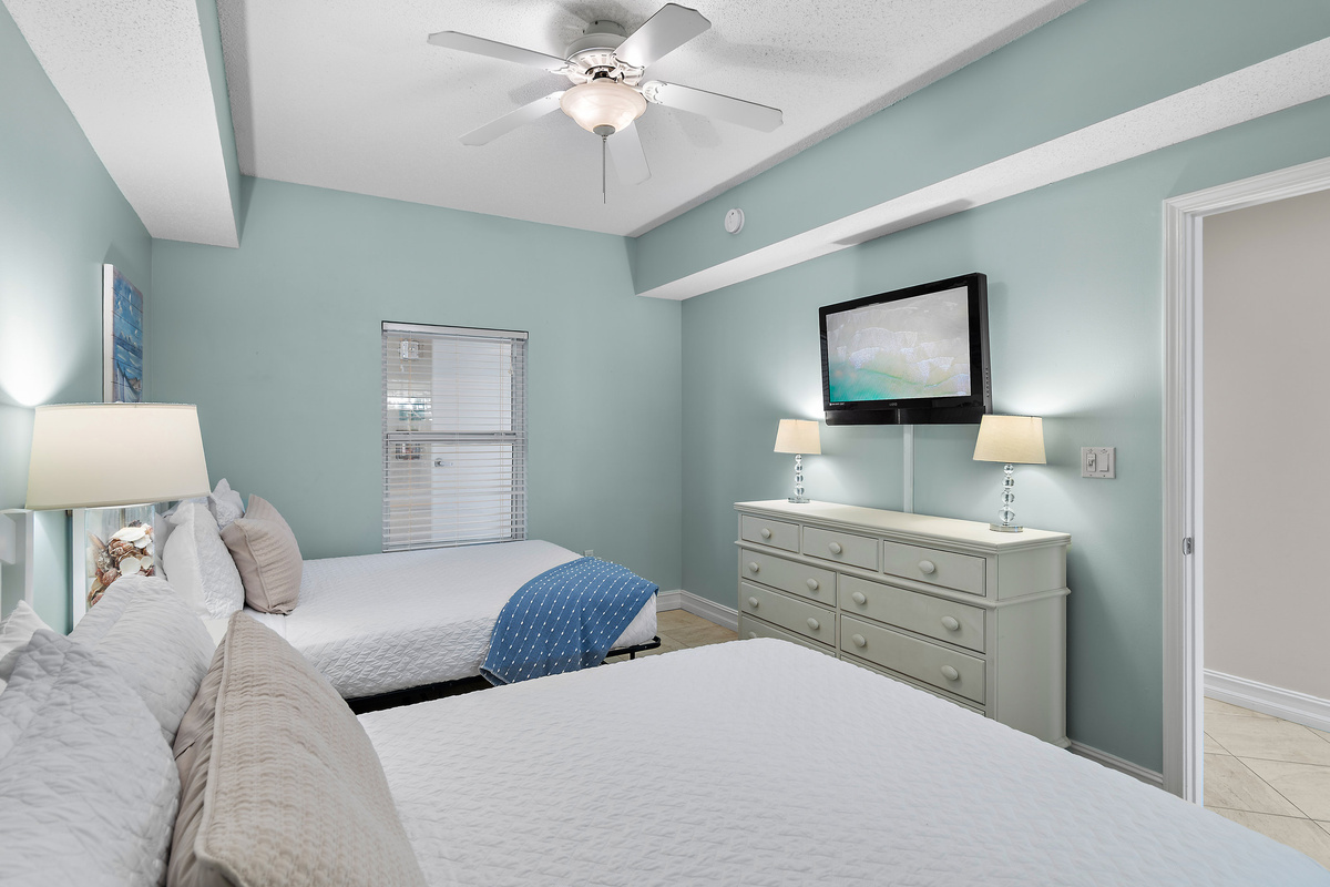 Guest Bedroom 2: 2 Full Beds, Smart TV, Shared Bathroom with Shower/Tub Combo (sleeps 4)