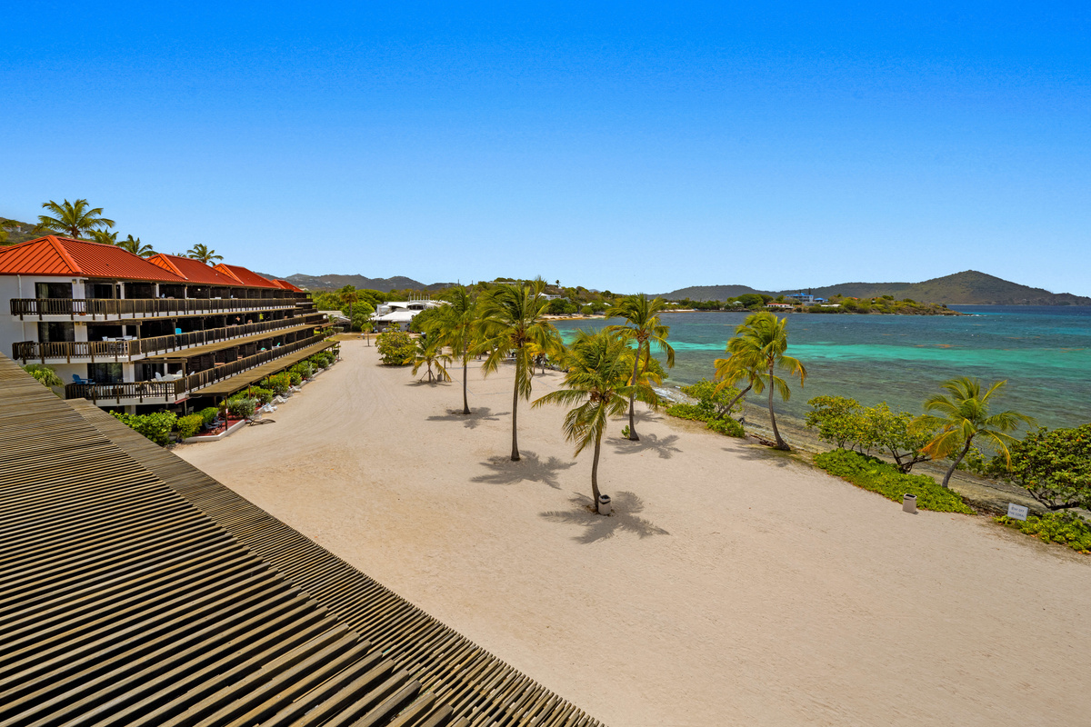 Wake up to stunning views of the beach and enjoy the beauty of island living right from your private balcony.
