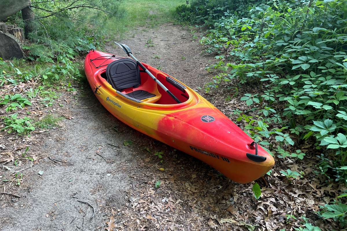 Kayak on pathway to waterfront