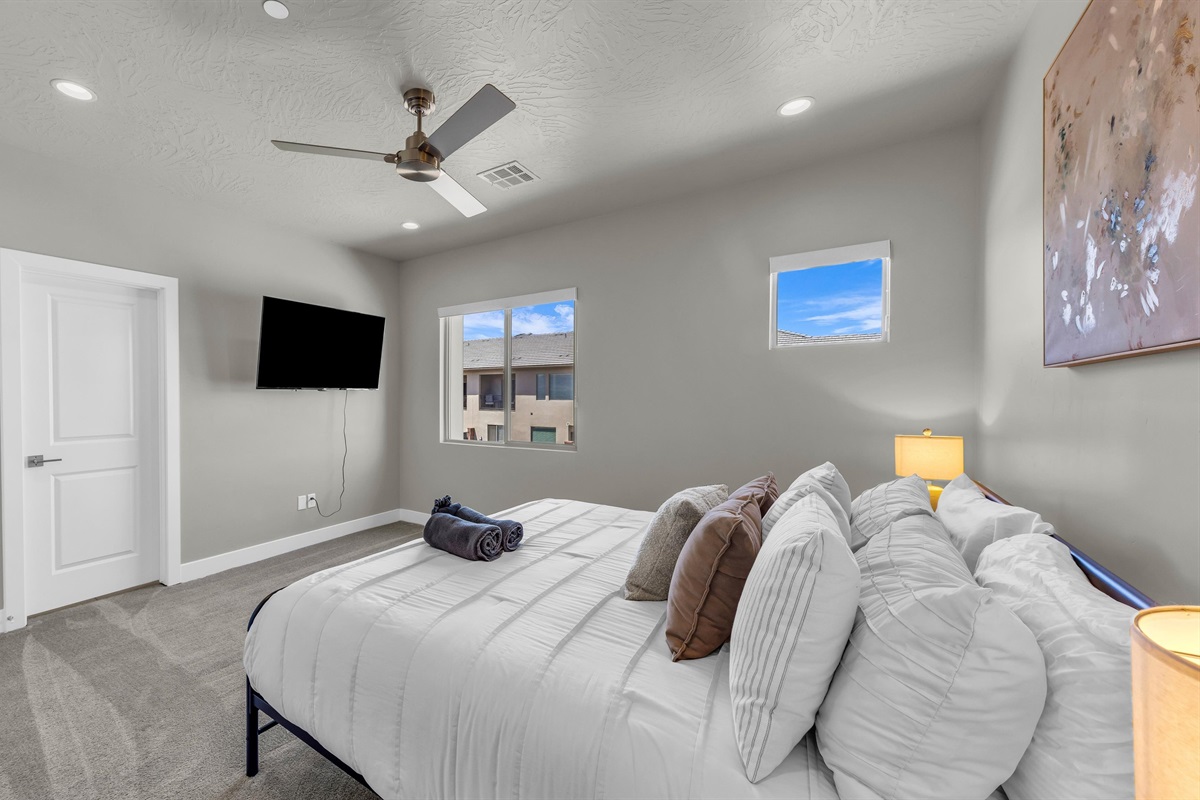 King Bedroom with Wall-Mounted Smart TV