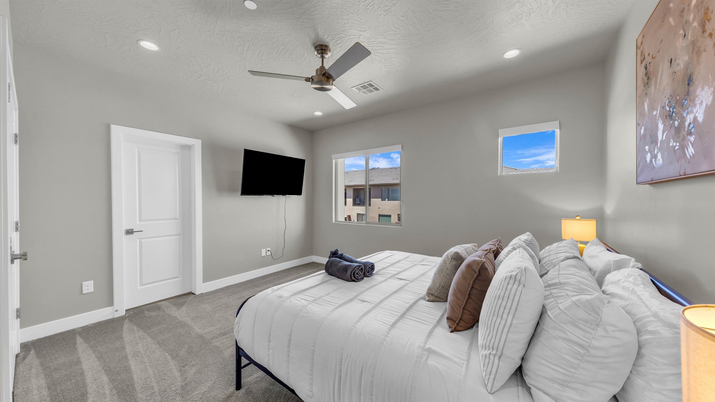 King Bedroom with Wall-Mounted Smart TV