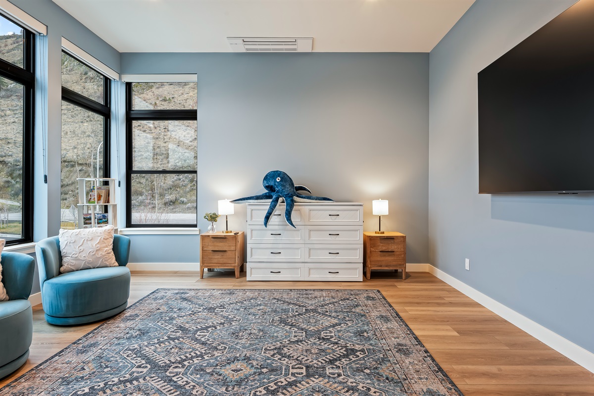 Bedroom #7 of 7 - Upstairs bonus room with queen sized murphy pull out bed, two twin bunks, smart TV, great space for kids and ensuite with walk in shower