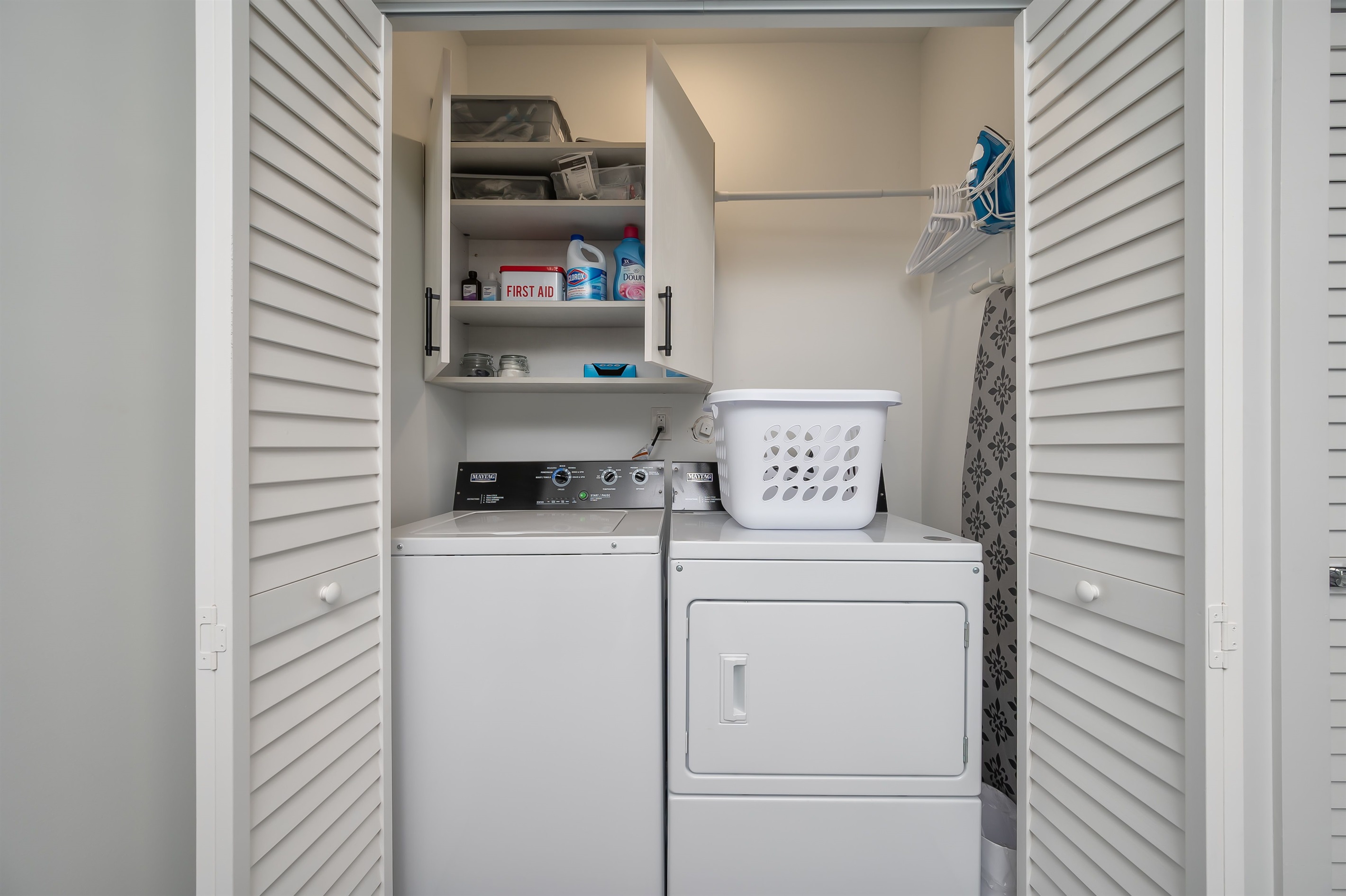 Laundry space in the garage with detergent included