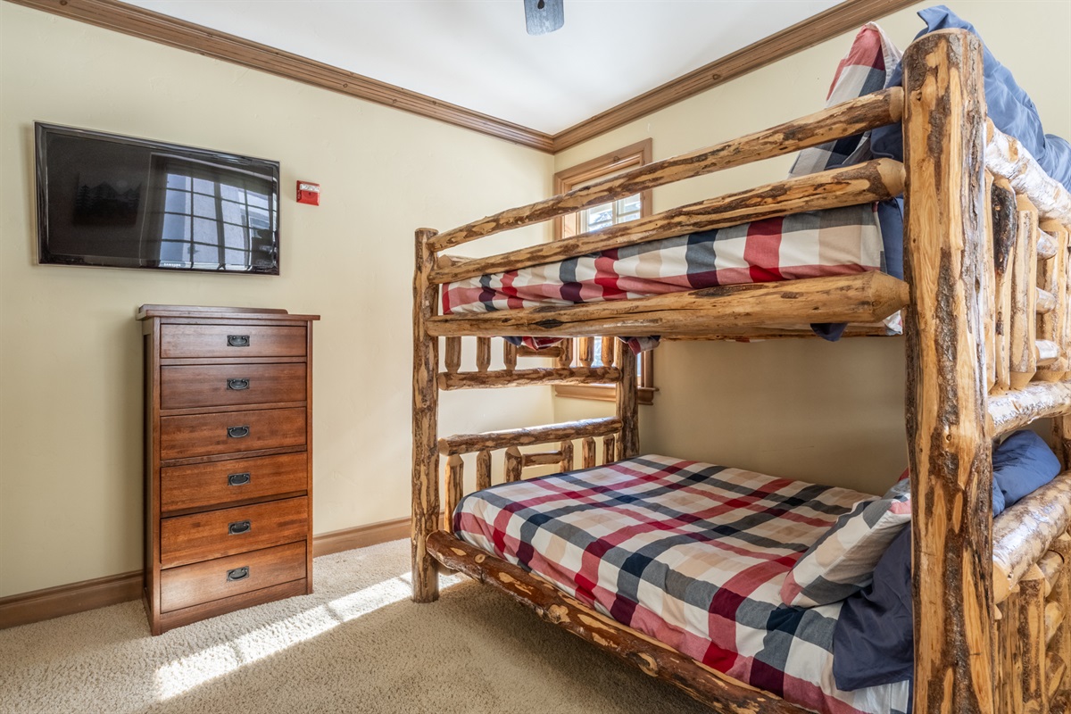 Full over full, handcrafted log beds work well for adults or kids.