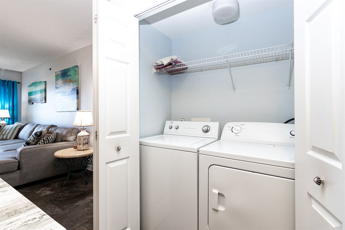 Laundry area with full size washer and dryer in the unit