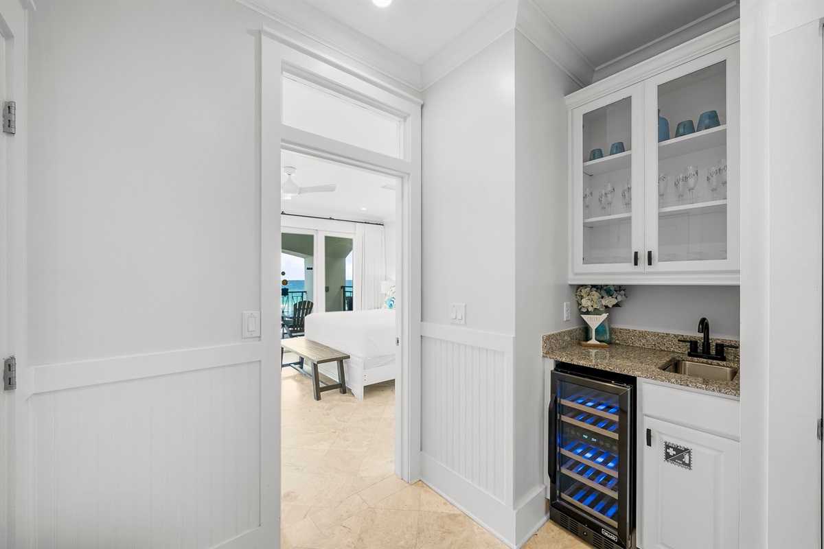 First Floor Small Kitchenette with mini-fridge, sink, and Keurig