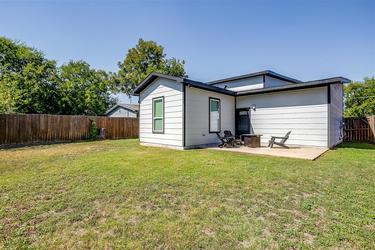 Huge fenced yard with space to roam, play, or let pets run.