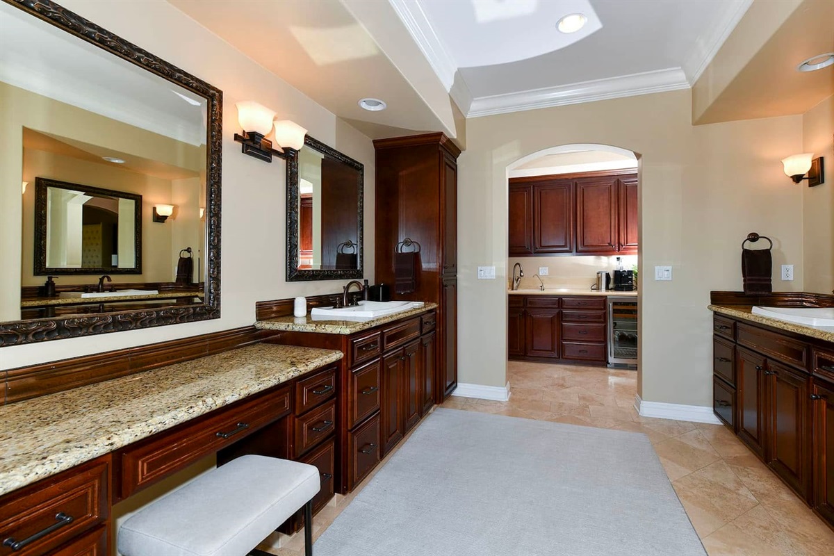 Primary bathroom with jacuzzi and shower.
