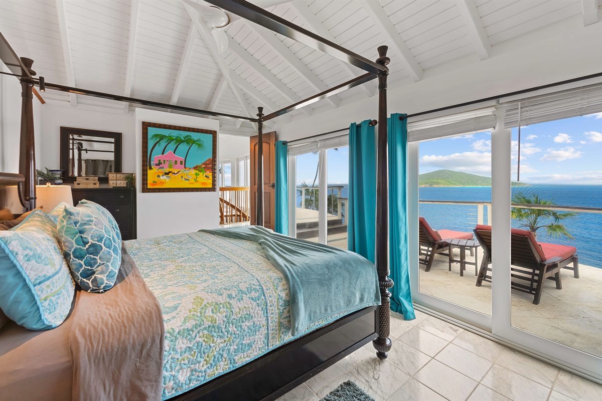 The primary bedroom has views that will keep you lounging in bed to enjoy