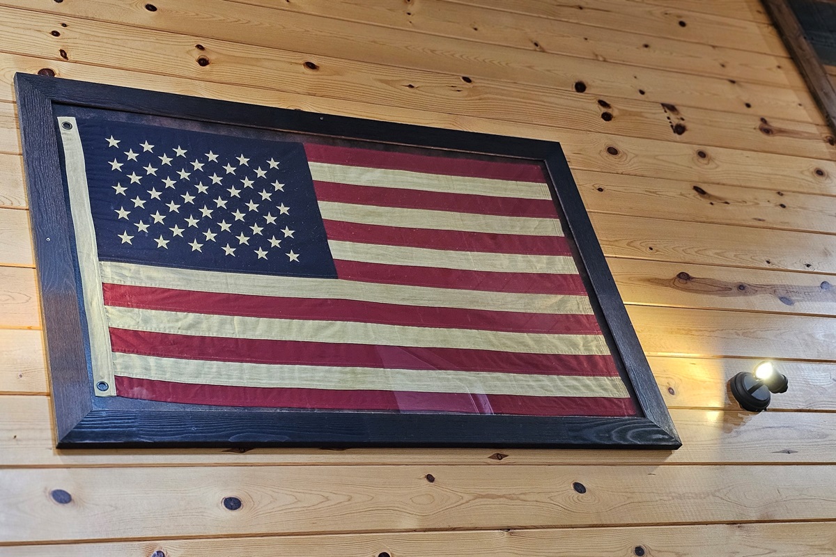 Old Glory’s gentle glow brightens the space.