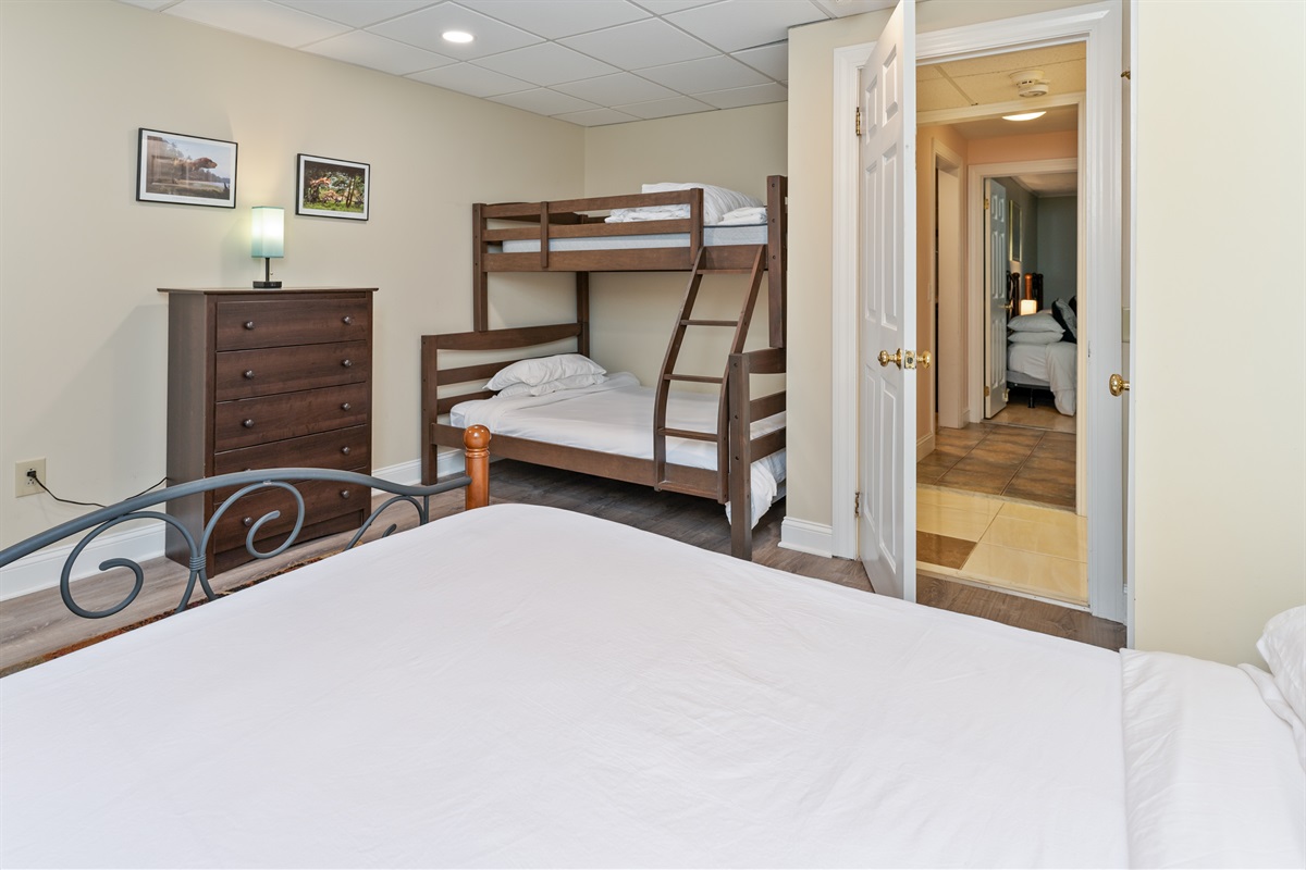 Lower level Queen bedroom with bunk beds(full on the bottom/twin on top)