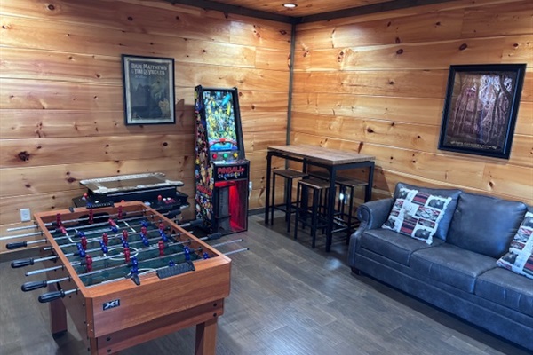 Game room now has foosball in addition to pinball and multicade.  Couch converts to a queen sleeper sofa.