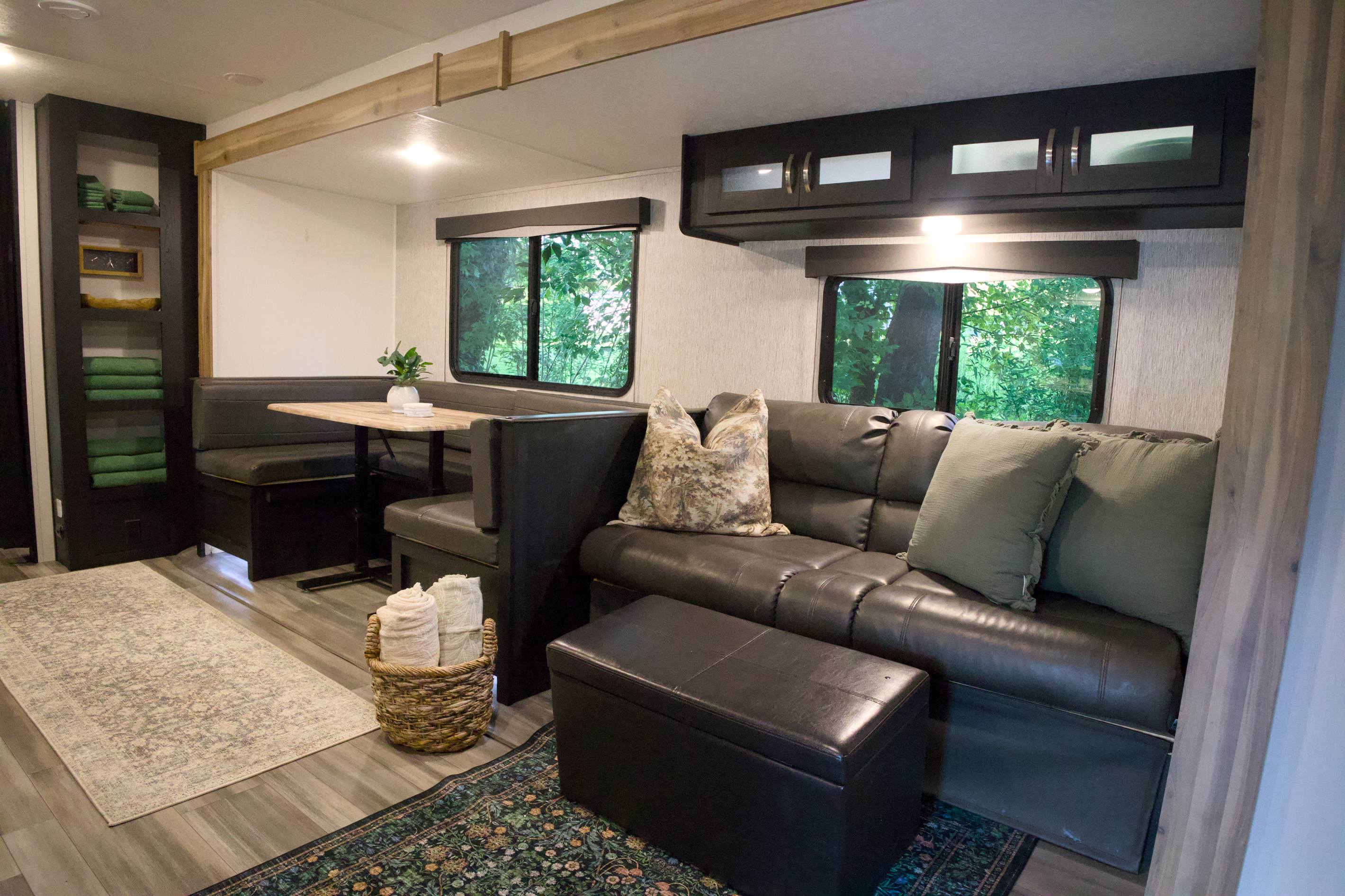 Comfy sofa for respite. This view is as you enter the camper.