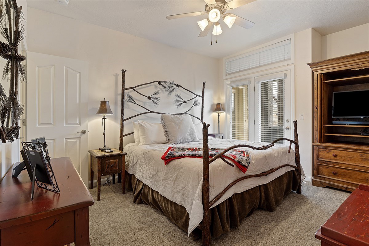 Relax in a spacious primary suite designed for restful nights.