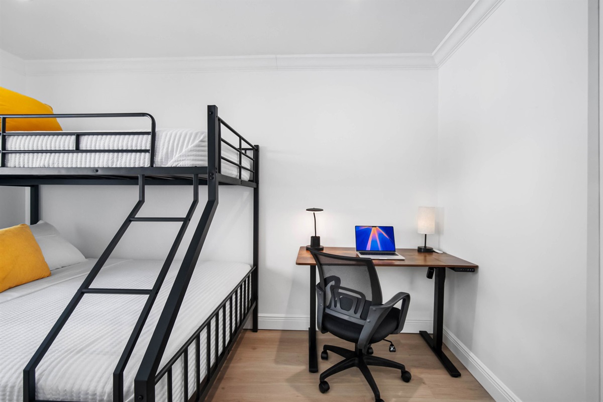 With a laptop-ready desk and ergonomic chair, this room is as productive as it is cozy.