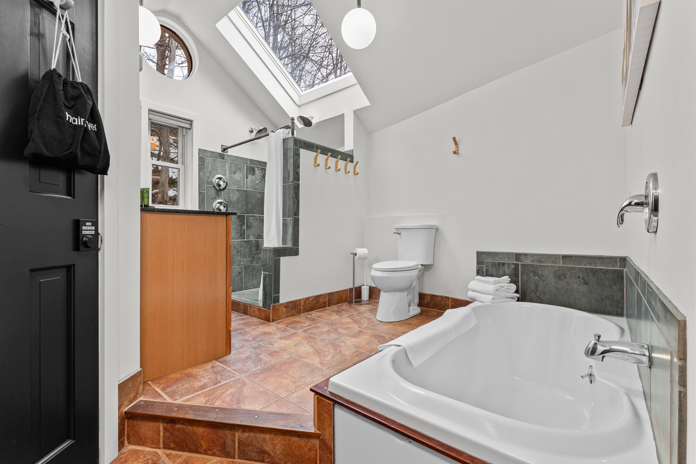 Grand 1st floor bathroom with heated floors