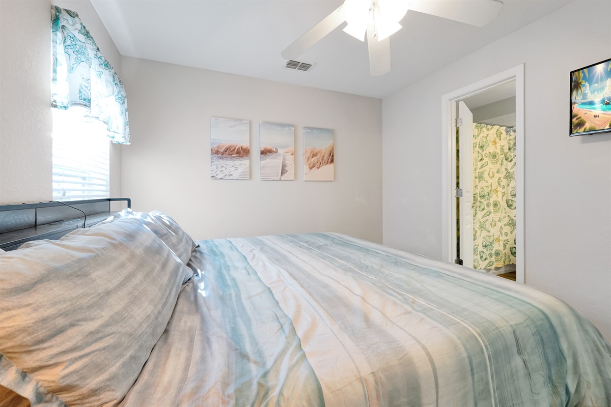 Bath with tub on main floor - entry to bedroom and living space
