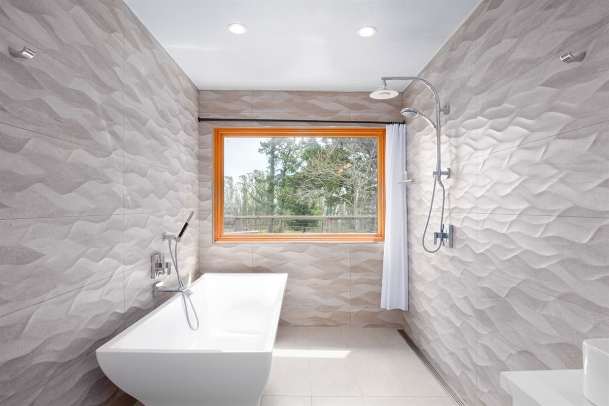 This modern Primary Bathroom will surely impress. Enjoy the open concept shower or the soaking tub. Complete with all the amenities you need to get ready for a day in wine country or winding down after a long day. 