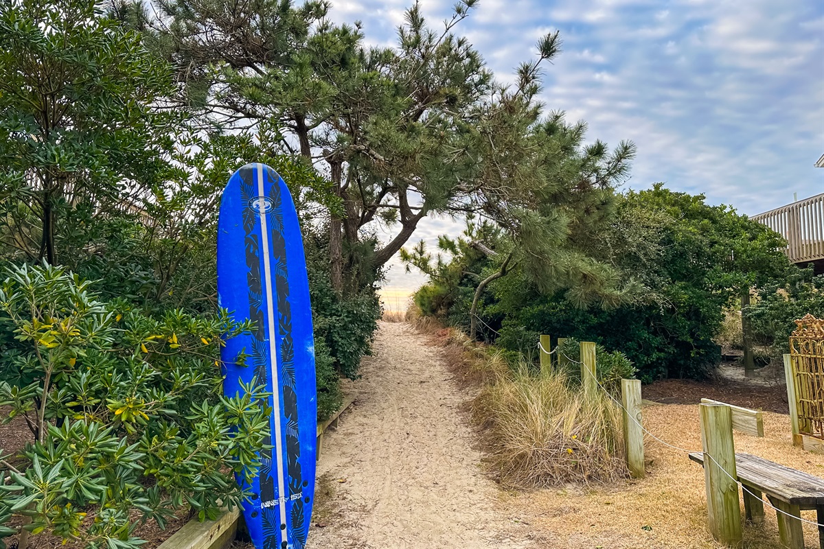 Grab a board and follow the path out to the gorgeous beach...