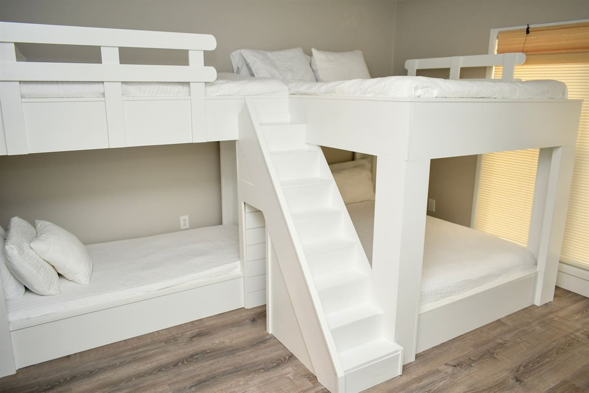 Queen over Queen and Twin over Twin bunks. All with own reading lights. 