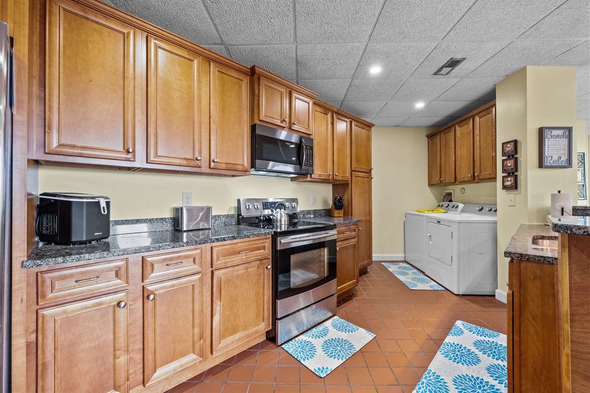 Spacious prep and cleanup area with clear sightlines into the living space