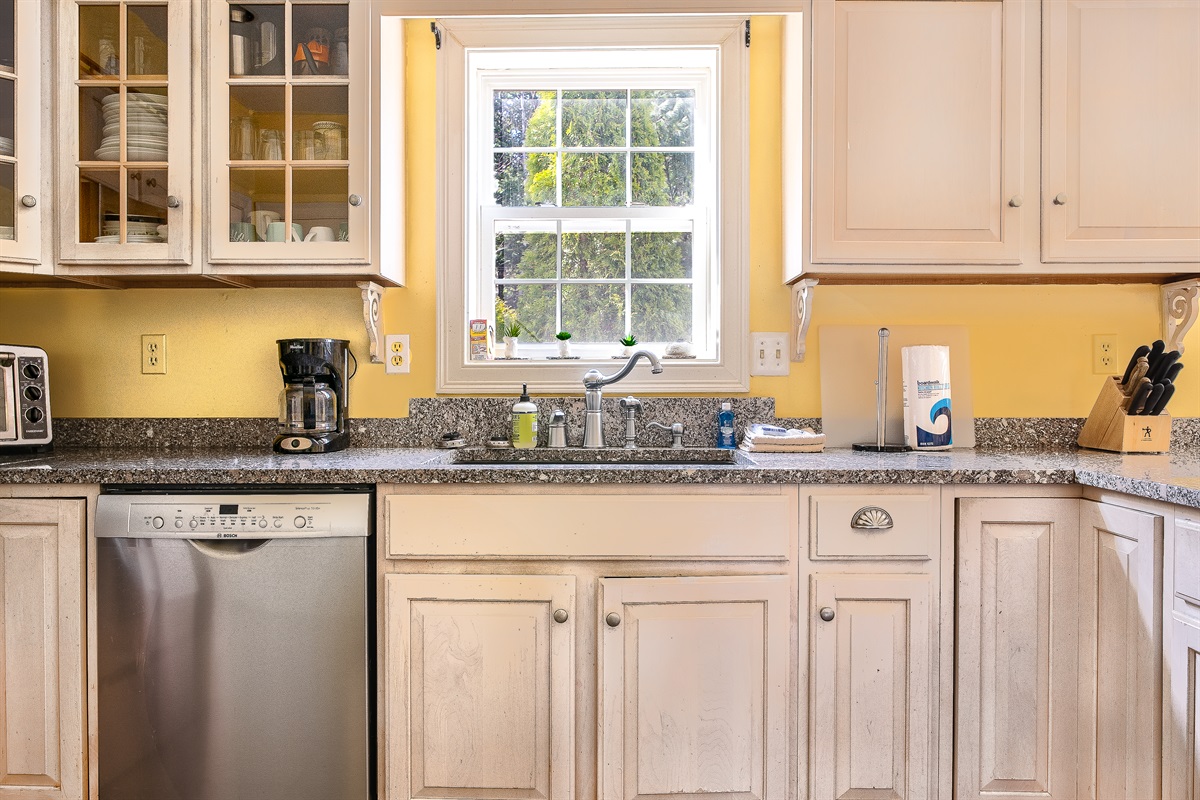 Cleanup is a breeze with the stainless steel Bosch dishwasher and a bright kitchen window overlooking the deck and backyard. We provide quality essentials to keep your Acadia National Park home base organized and efficient.