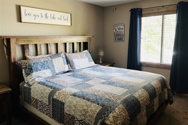 Master bedroom with king size bed and private bathroom.  Oh and did we mention you can see the lake from your bed!