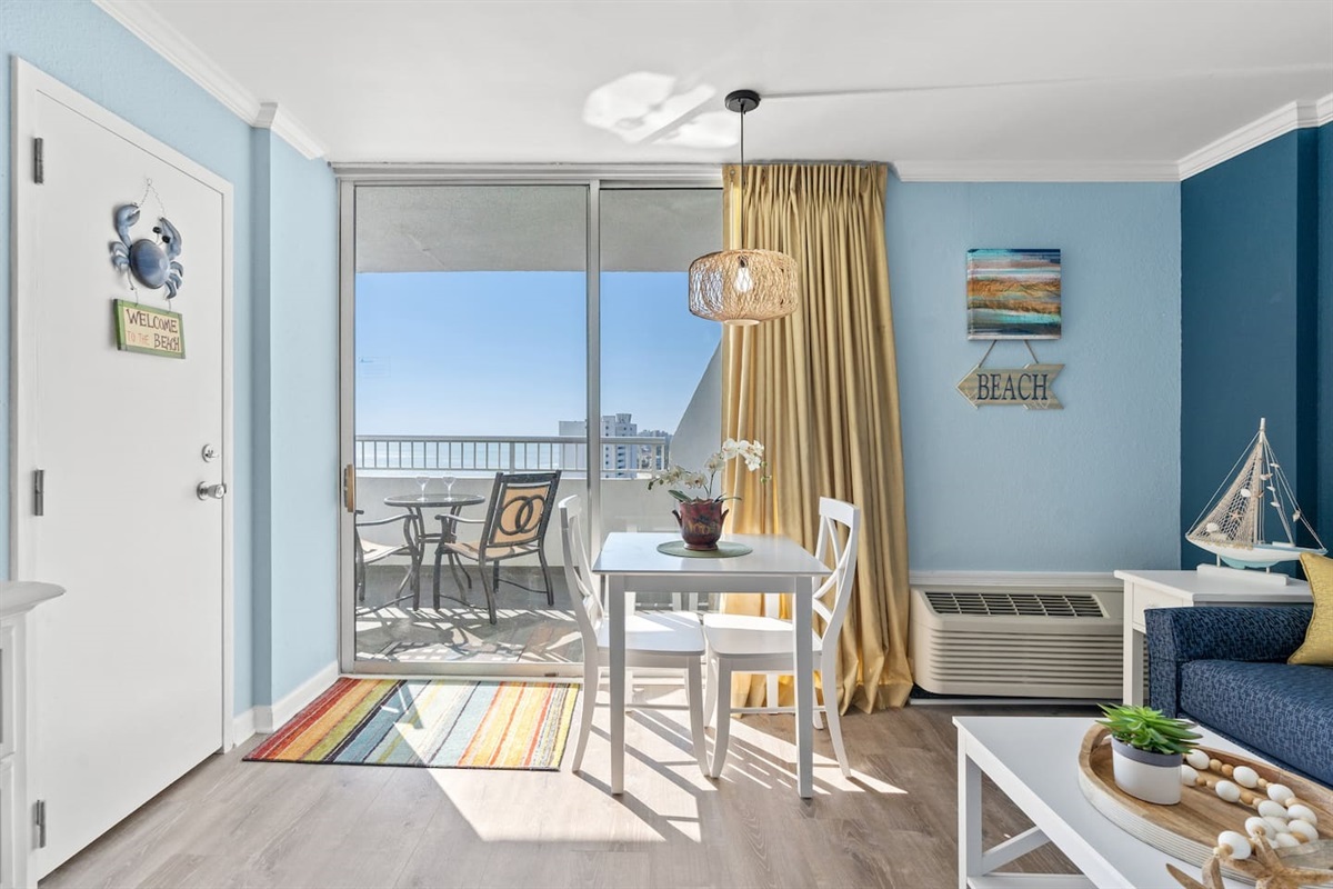 Cozy eating area with beautiful views of the beach.