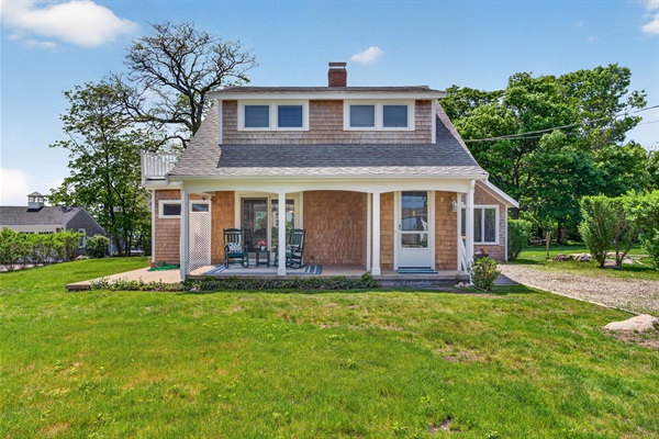 A well-maintained green yard with lush grass, offering an open outdoor space for relaxation and recreation.
