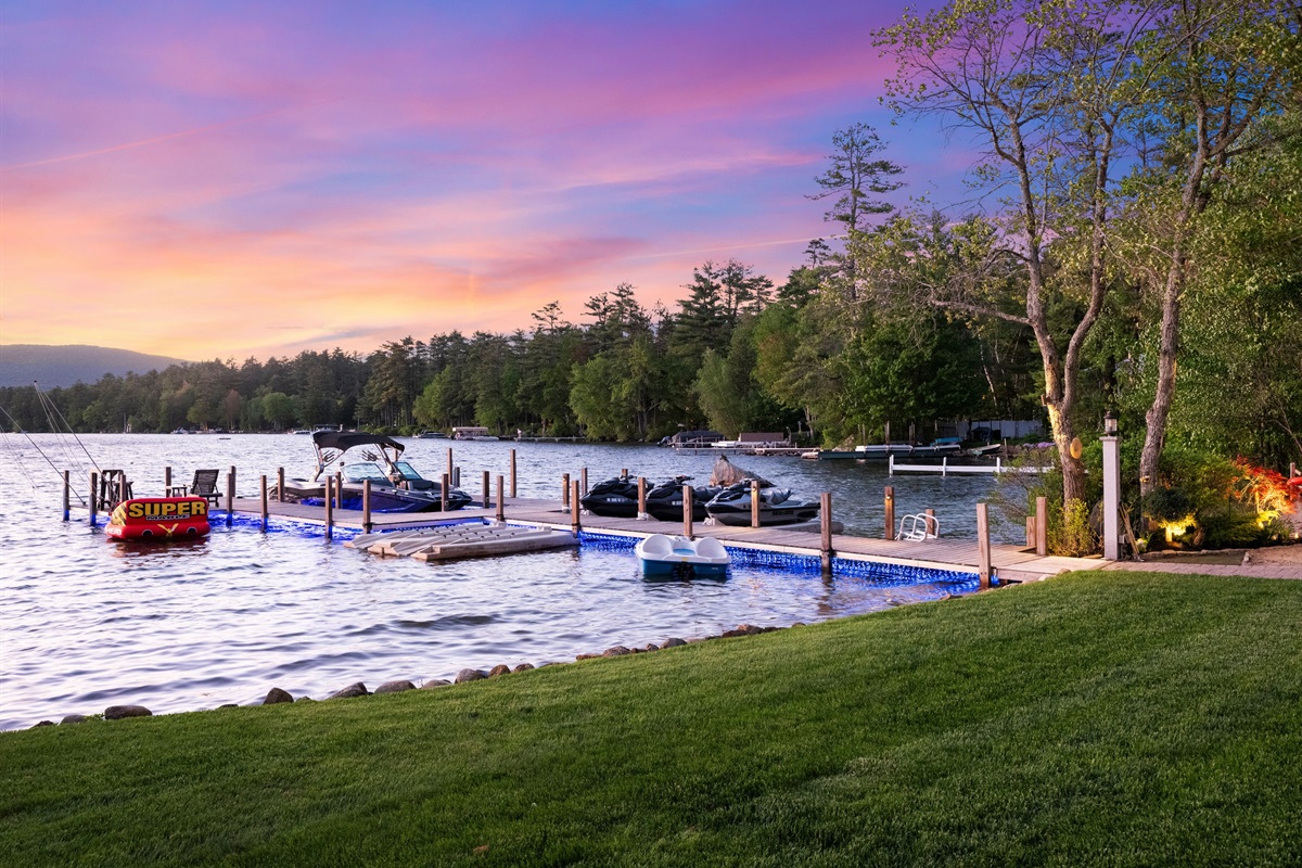 Twilight shot of home at dusk with luxury landscape lighting