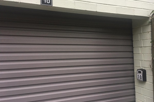 Lock-up garage with EV charger.