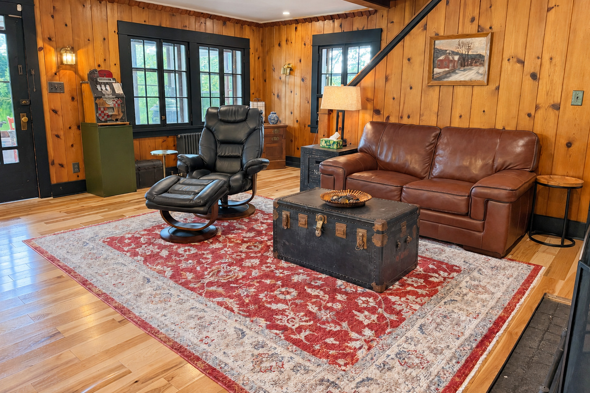 Lounging area with original fireplace.