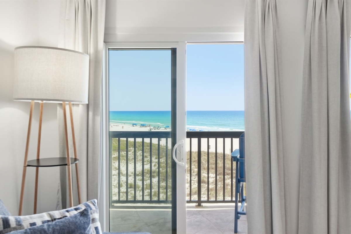 Living room walkout to beachfront balcony