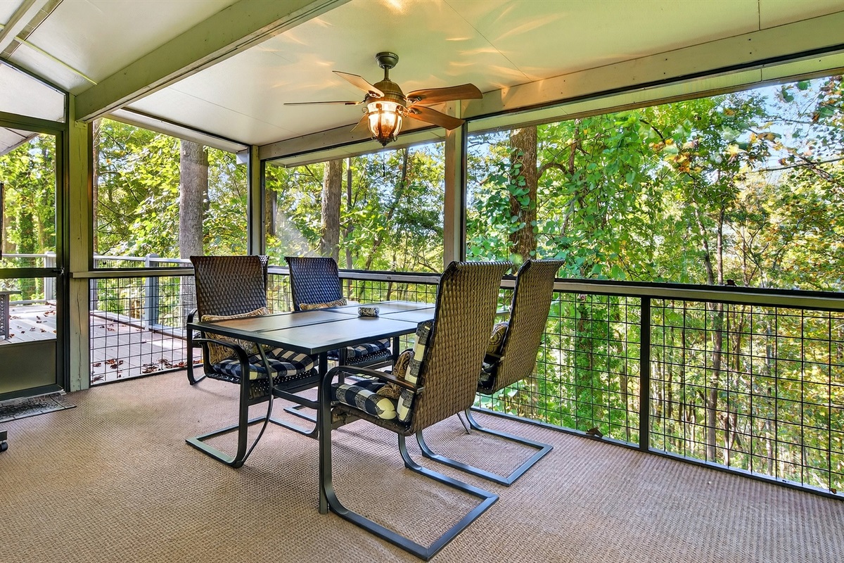 Outdoor dining, seating for 4 on the upper-level screened in porch..