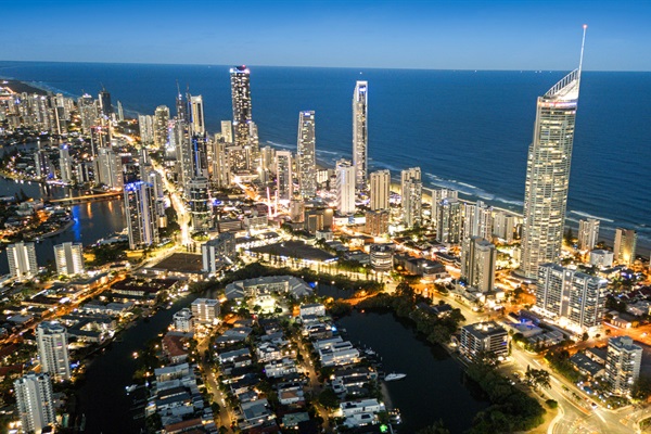 Experience the energy of Surfers Paradise by night, just minutes from your private waterfront retreat.