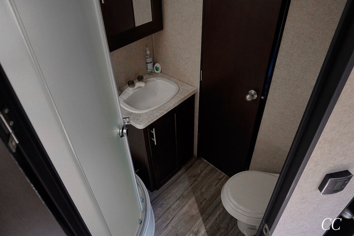 Clean private bathroom. Hot water tank is 8 gallon.