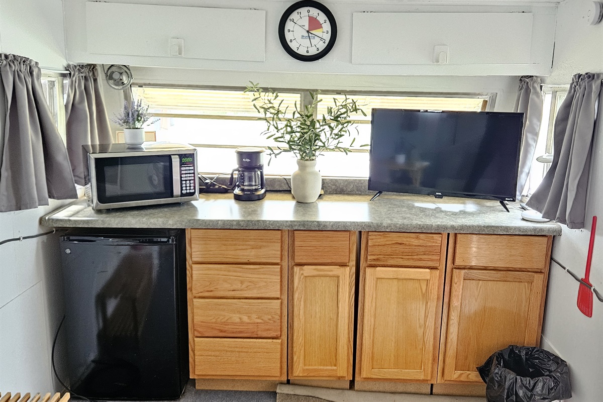 The kitchenette has Free WIFI, a 32" Smart TV for streaming, mini refrigerator, microwave, & coffee pot. Stop by the local groceries in town to get your favorite snacks and beverages to share with friends and never have to leave the dropzone again.
