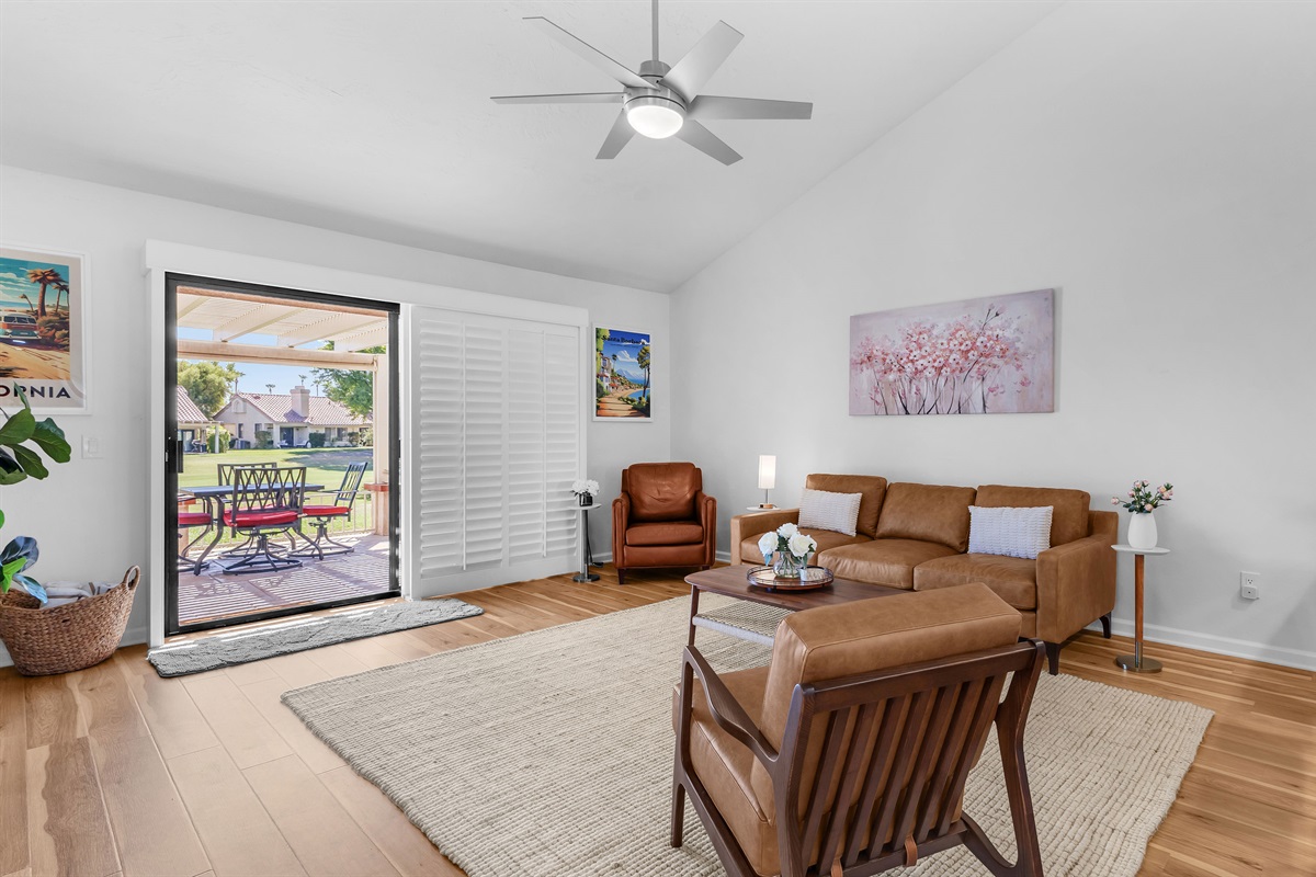 Direct access to a private patio overlooking the golf course.