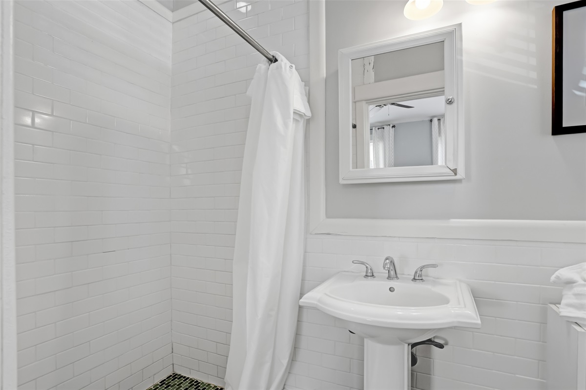 Enjoy a spacious walk-in shower designed for a refreshing start or relaxing end to your day.