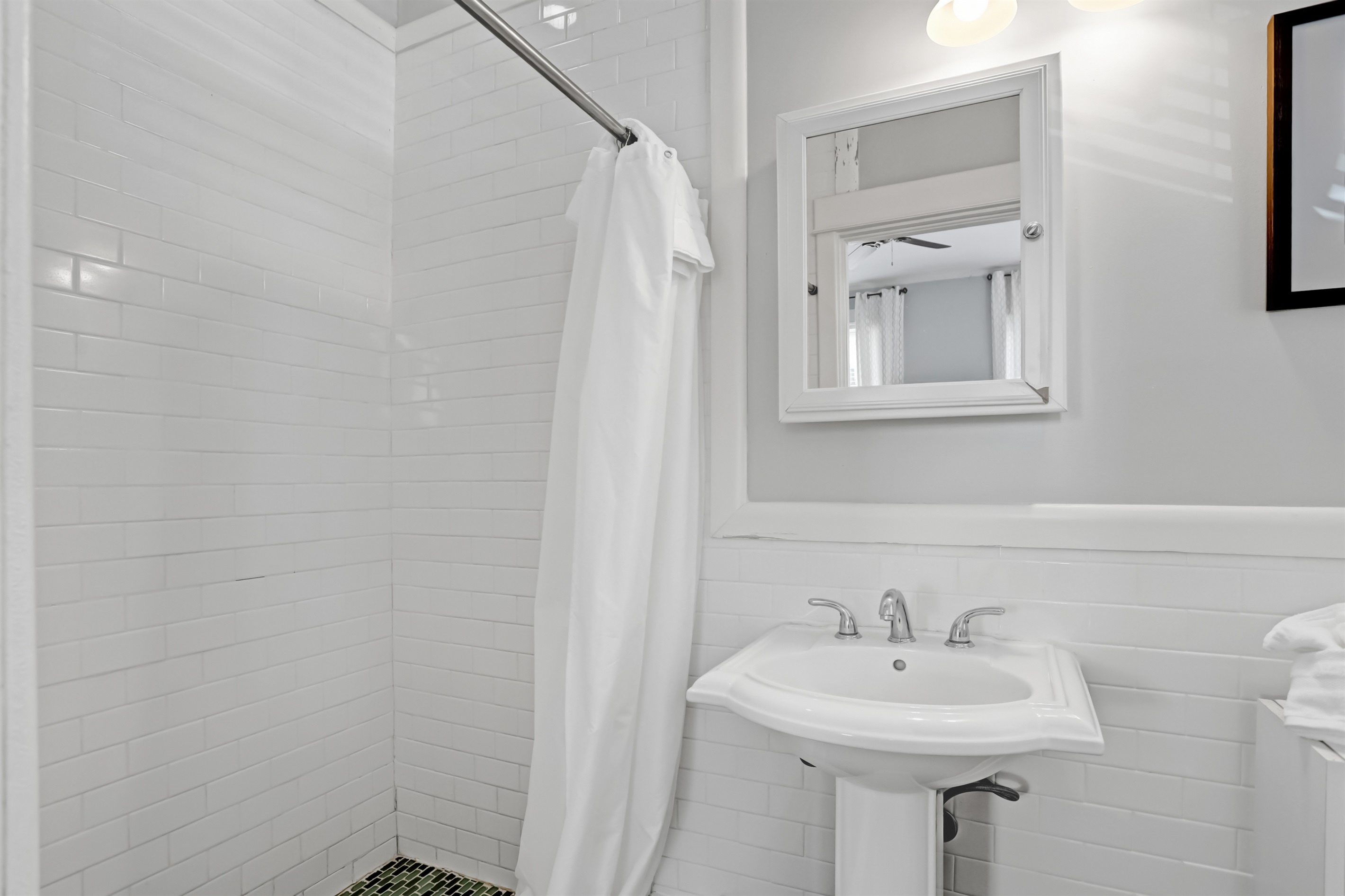 Enjoy a spacious walk-in shower designed for a refreshing start or relaxing end to your day.